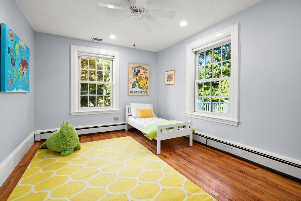 34 Upland Road Newton, MA 02468 - Photo 22 of 33 a bedroom with a bed and a window