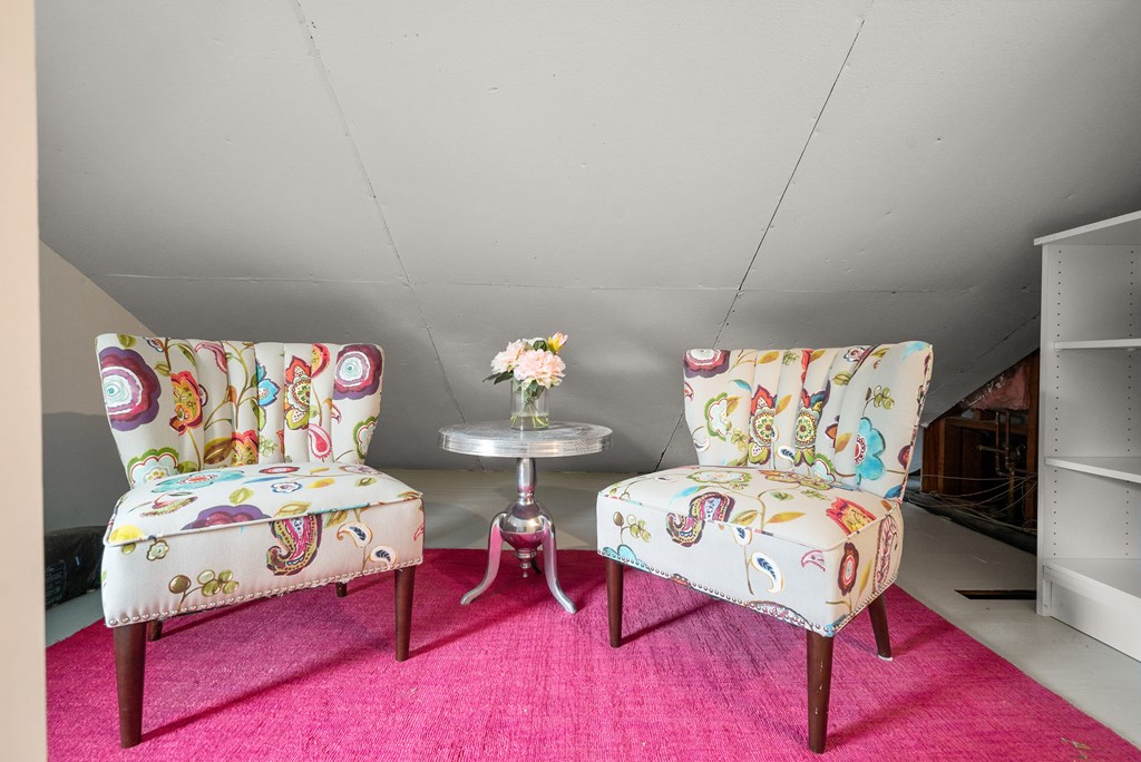 34 Upland Road Newton, MA 02468 - Photo 26 of 33 a bedroom with furniture and a wooden floor