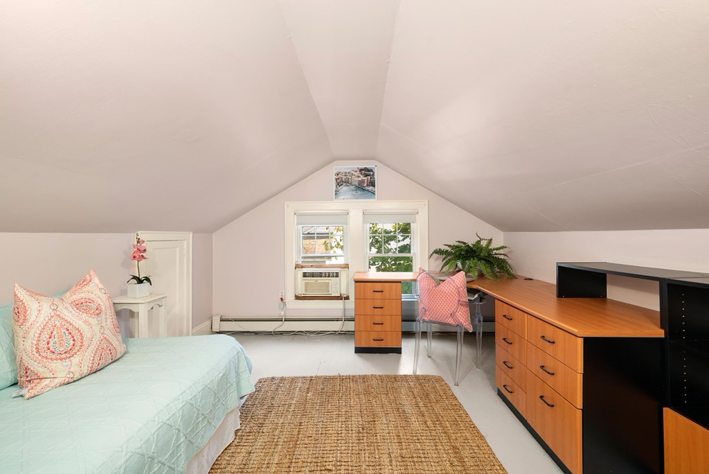 34 Upland Road Newton, MA 02468 - Photo 27 of 33 a living room with furniture and a large window