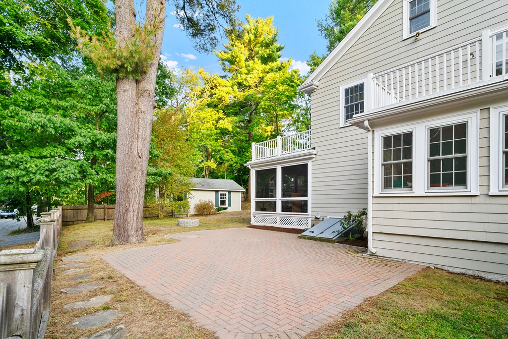 34 Upland Road Newton, MA 02468 - Photo 28 of 33 a house with trees in front of it