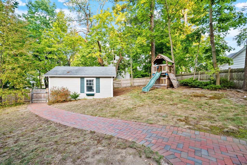 34 Upland Road Newton, MA 02468 - Photo 31 of 33 a view of a house with a yard and large tree