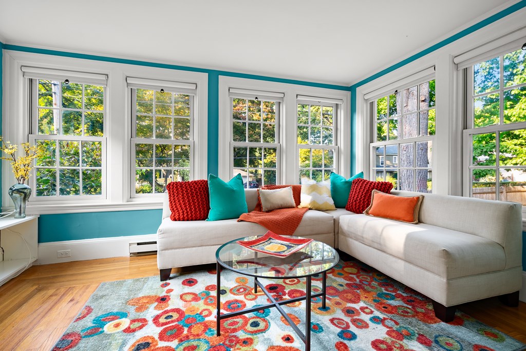 34 Upland Road Newton, MA 02468 - Photo 7 of 33 a living room with furniture and a large window