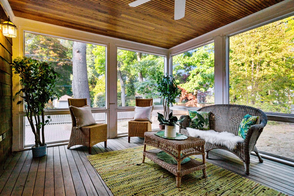 34 Upland Road Newton, MA 02468 - Photo 9 of 33 a outdoor living space with furniture and wooden floor