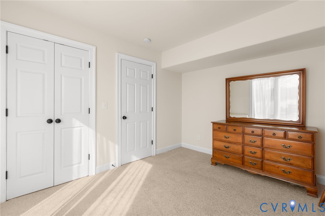 175 Shellfield Lane Colonial Beach, VA 22443 - Photo 54 of 100 Bedroom featuring light carpet and a closet