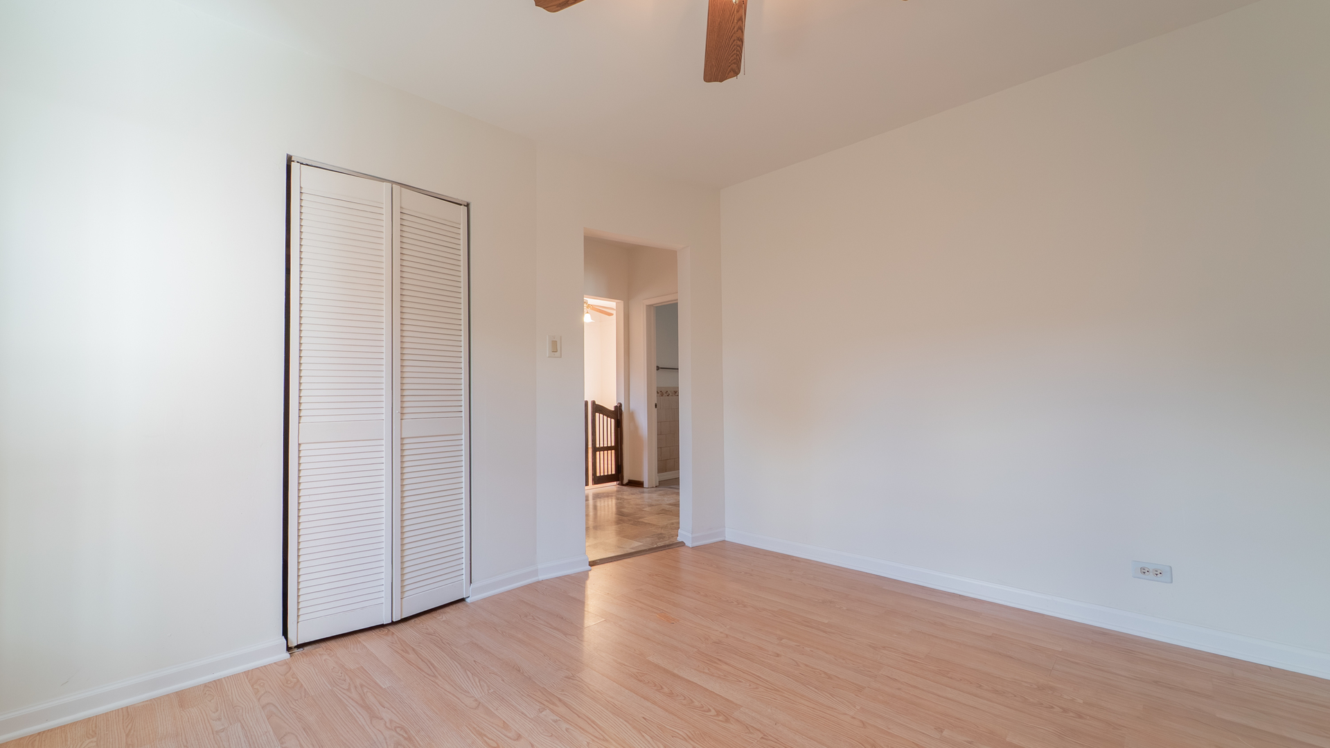 122 Elizabeth Street Calumet City, IL 60409 - Photo 21 of 31 a view of an empty room with wooden floor