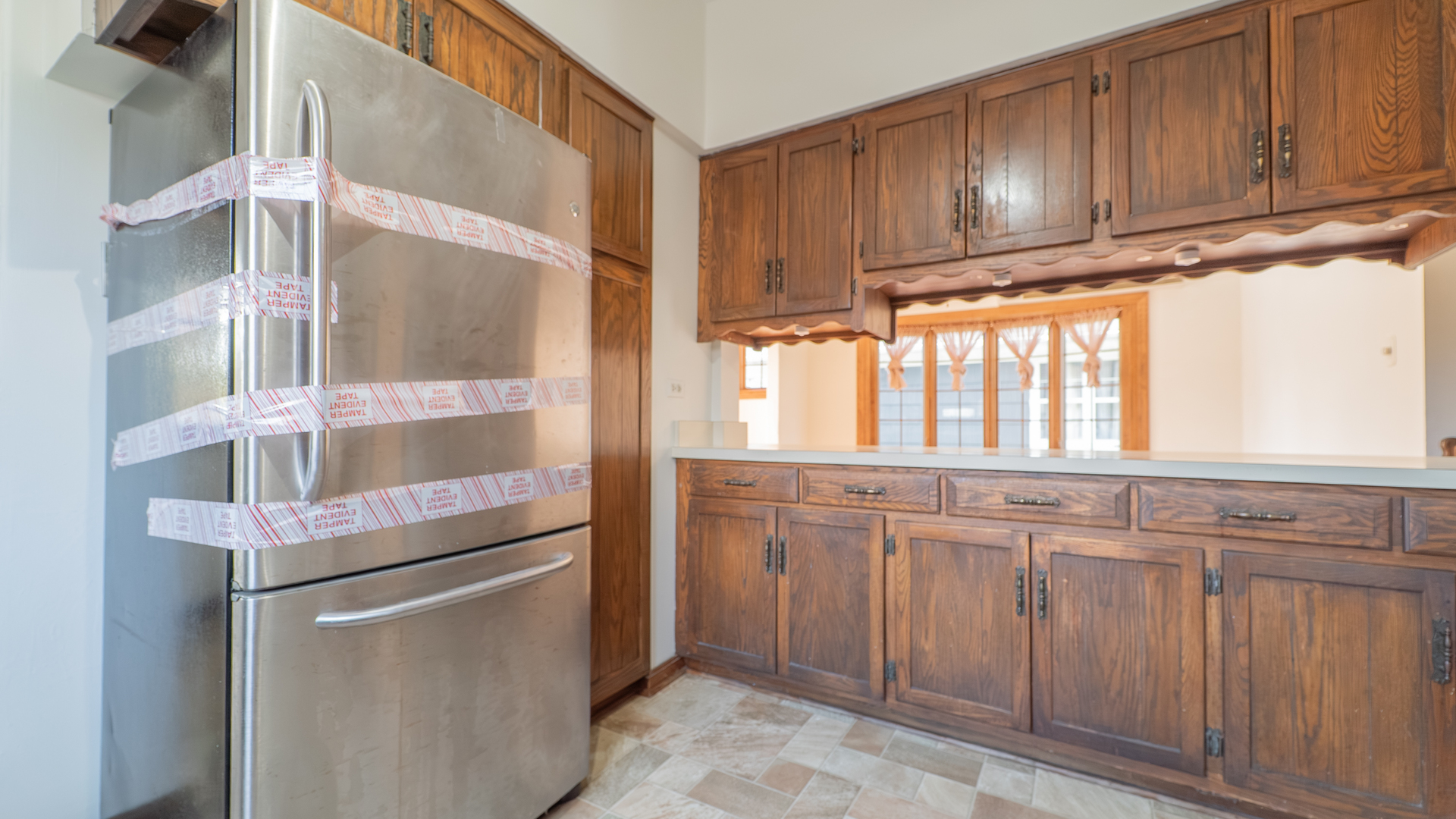 122 Elizabeth Street Calumet City, IL 60409 - Photo 7 of 31 a kitchen with stainless steel appliances granite countertop a refrigerator and a stove