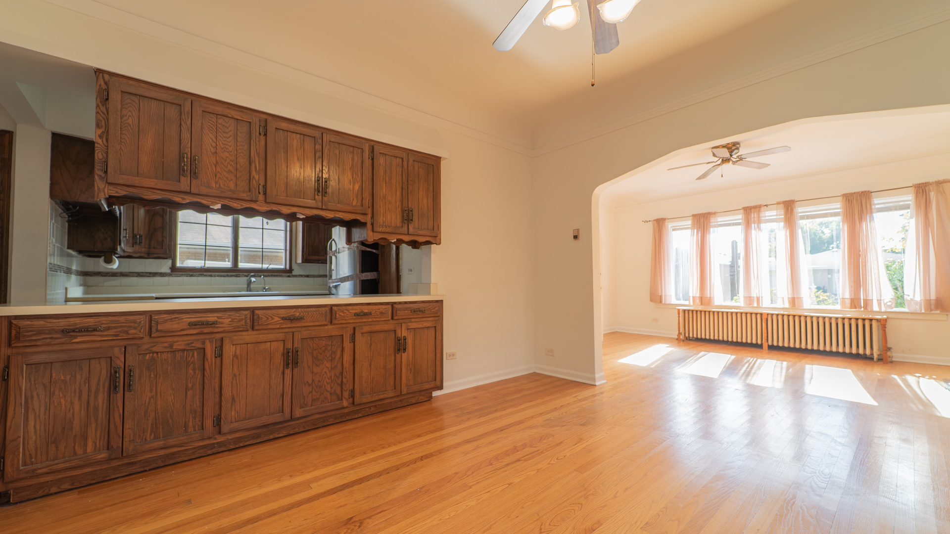 122 Elizabeth Street Calumet City, IL 60409 - Photo 9 of 31 a kitchen with stainless steel appliances granite countertop a stove a sink and a refrigerator