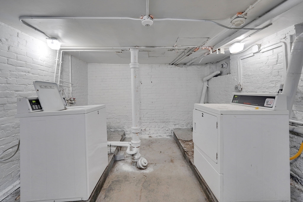 120-122 Central Street Springfield, MA 01103 - Photo 29 of 30 a utility room with dryer and washer