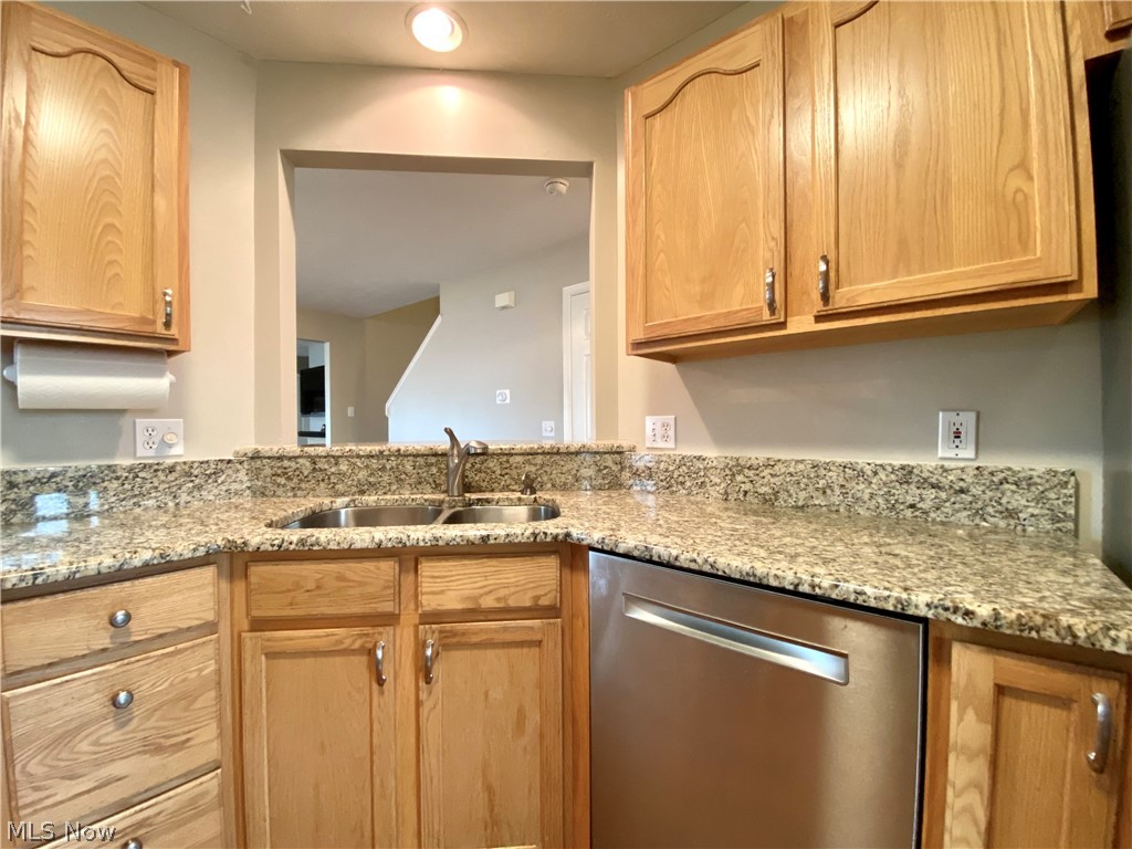 4386 Sexton Road Cleveland, OH 44105 - Photo 8 of 30 Kitchen with granite surfaces and stainless appliances