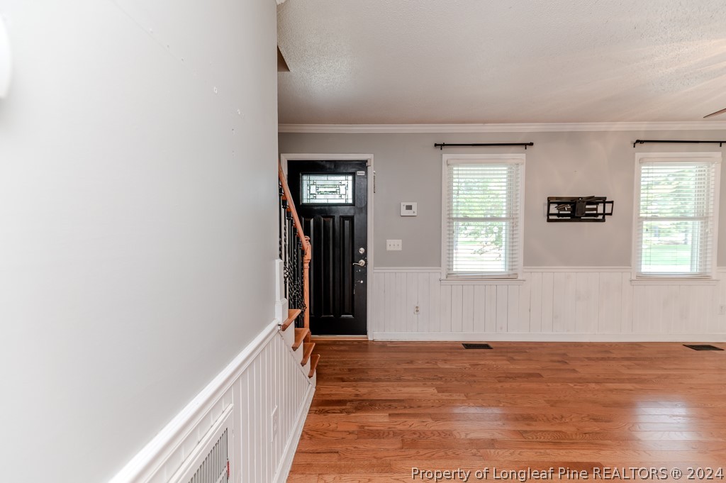 925 Line Road Cameron, NC 28326 - Photo 24 of 42 a view of hallway with window and wooden floor