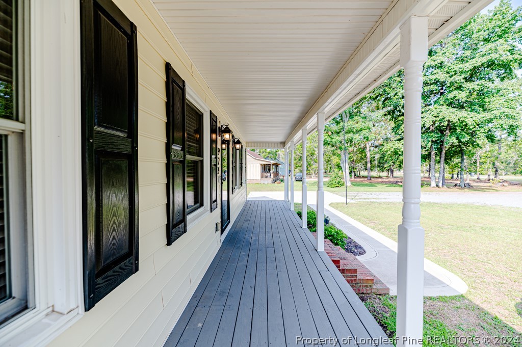 925 Line Road Cameron, NC 28326 - Photo 34 of 42 a view of balcony with wooden floor