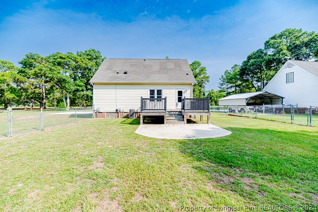 925 Line Road Cameron, NC 28326 - Photo 37 of 42 a view of a house with pool and a yard