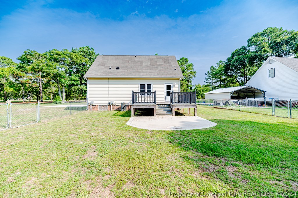925 Line Road Cameron, NC 28326 - Photo 38 of 42 a view of a house with pool and a yard