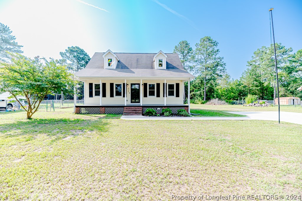 925 Line Road Cameron, NC 28326 - Photo 39 of 42 a house view with a garden space