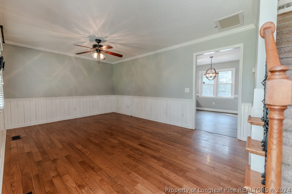 925 Line Road Cameron, NC 28326 - Photo 6 of 42 wooden floor in an empty room with a window