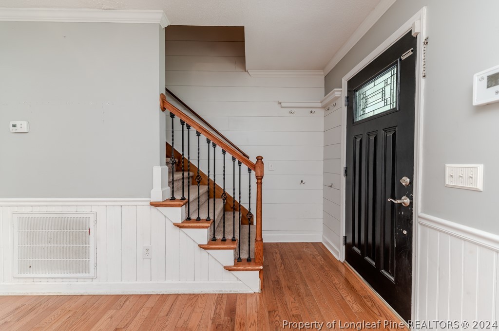 925 Line Road Cameron, NC 28326 - Photo 9 of 42 a view of entryway with wooden floor and stairs