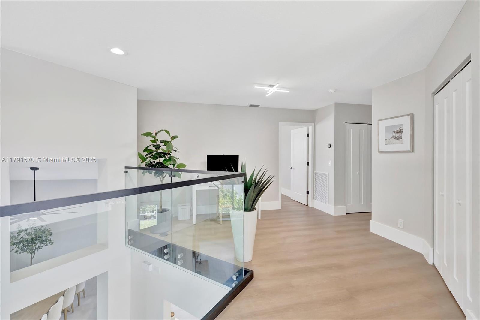 6393 Brava Way Boca Raton, FL 33433 - Photo 23 of 55 a view of an entryway and kitchen