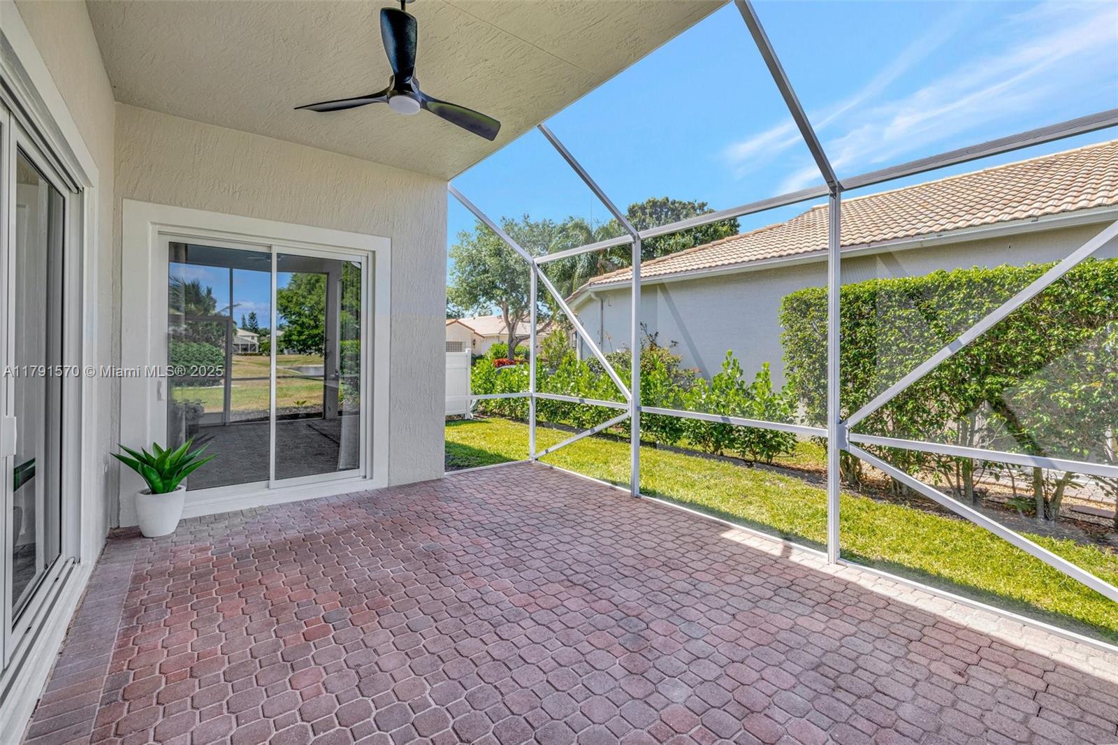 6393 Brava Way Boca Raton, FL 33433 - Photo 36 of 55 a view of a backyard