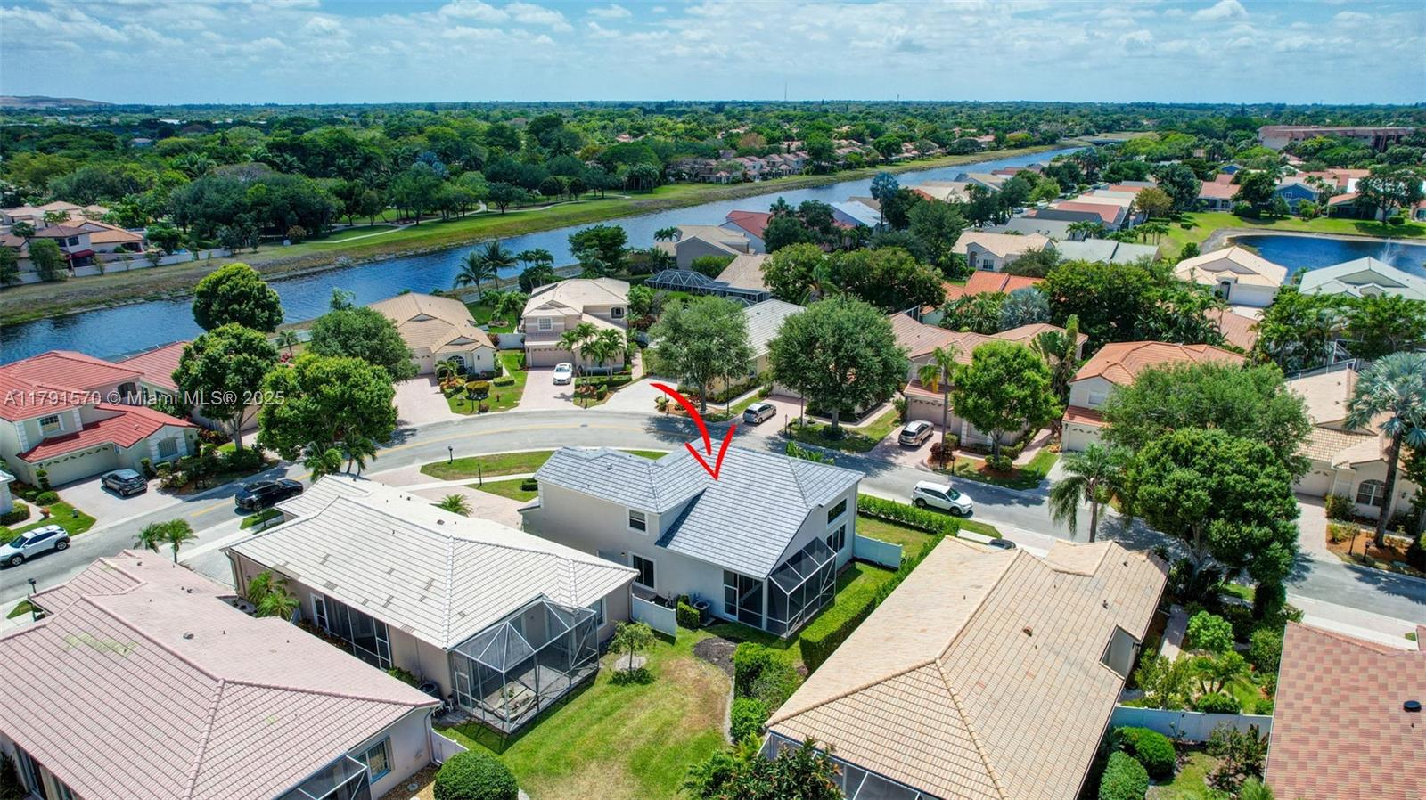 6393 Brava Way Boca Raton, FL 33433 - Photo 44 of 55 an aerial view of a house with outdoor space and lake view