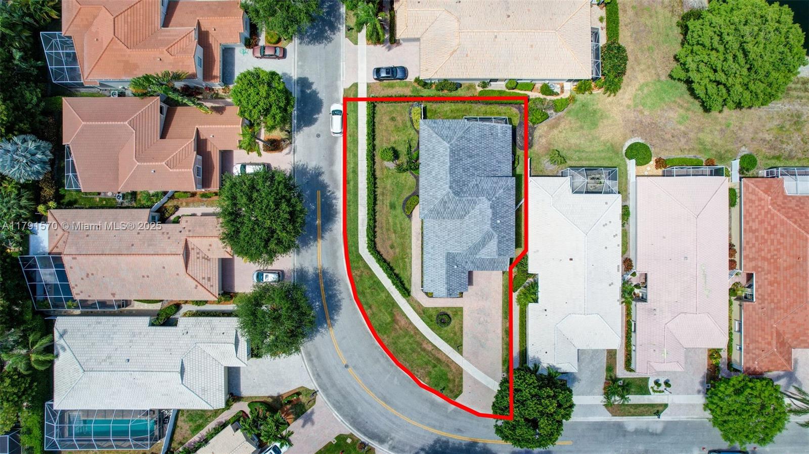 6393 Brava Way Boca Raton, FL 33433 - Photo 51 of 55 an aerial view of a house with a swimming pool