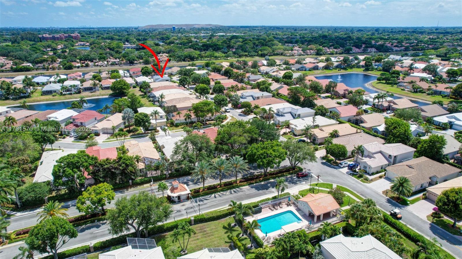 6393 Brava Way Boca Raton, FL 33433 - Photo 53 of 55 an aerial view of residential houses with outdoor space and trees all around