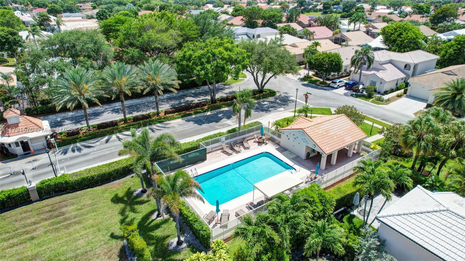 6393 Brava Way Boca Raton, FL 33433 - Photo 54 of 55 an aerial view of a house with a swimming pool