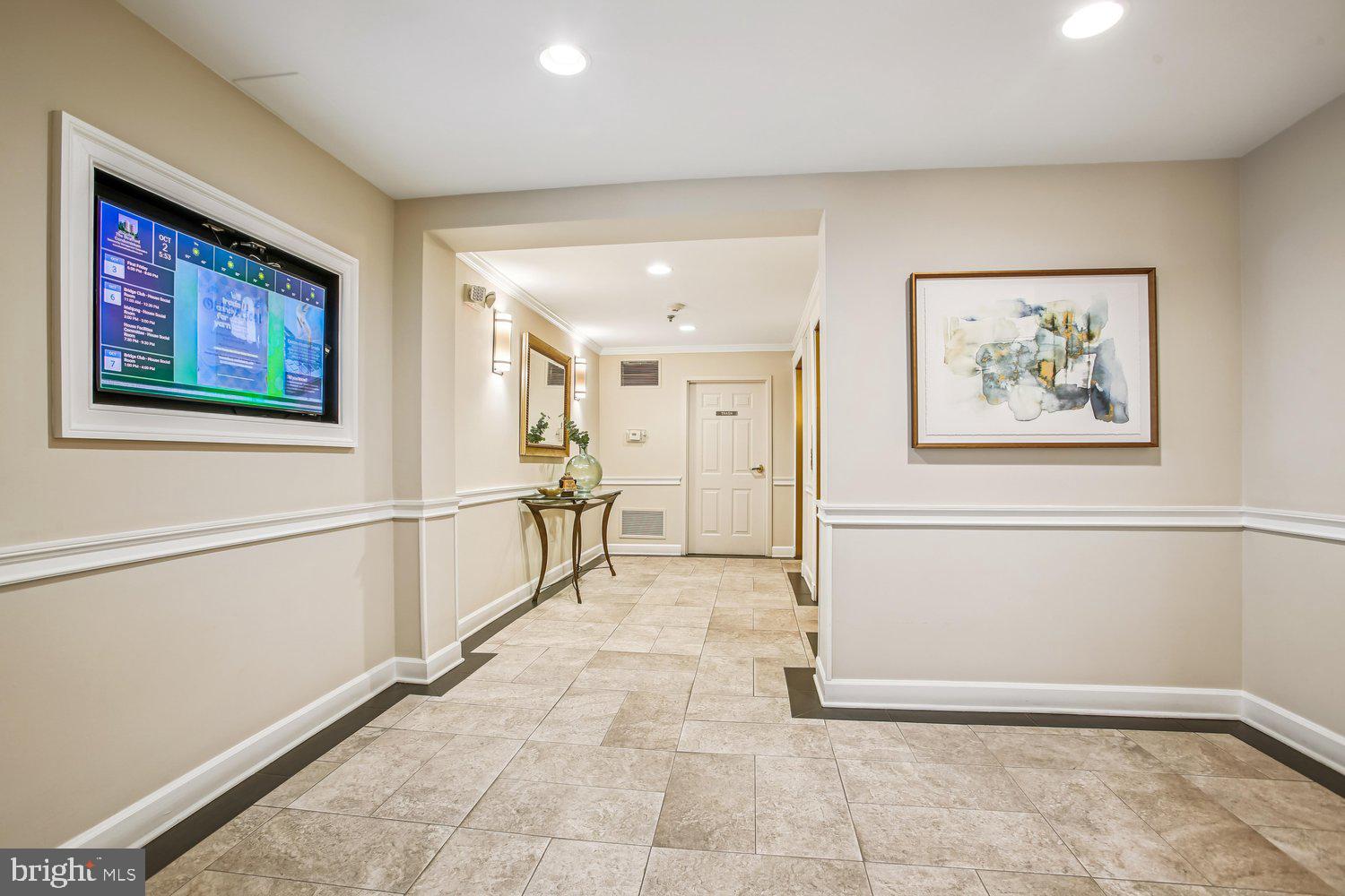 1855 Stratford Park Place, Unit 103 Reston, VA 20190 - Photo 4 of 49 Building Lobby.