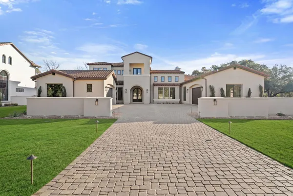 a house view with a garden space