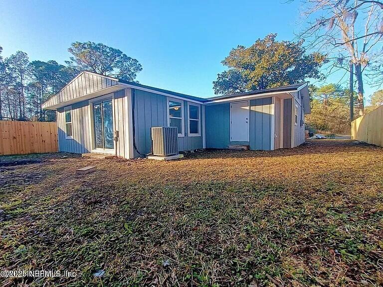 9420 Joos Road Jacksonville, FL 32220 - Photo 2 of 9 a view of a house with a yard