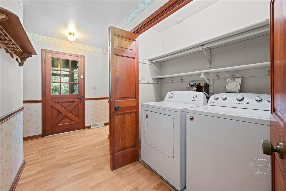 6N400 Old Homestead Road St. Charles, IL 60175 - Photo 16 of 32 a utility room with dryer and washer
