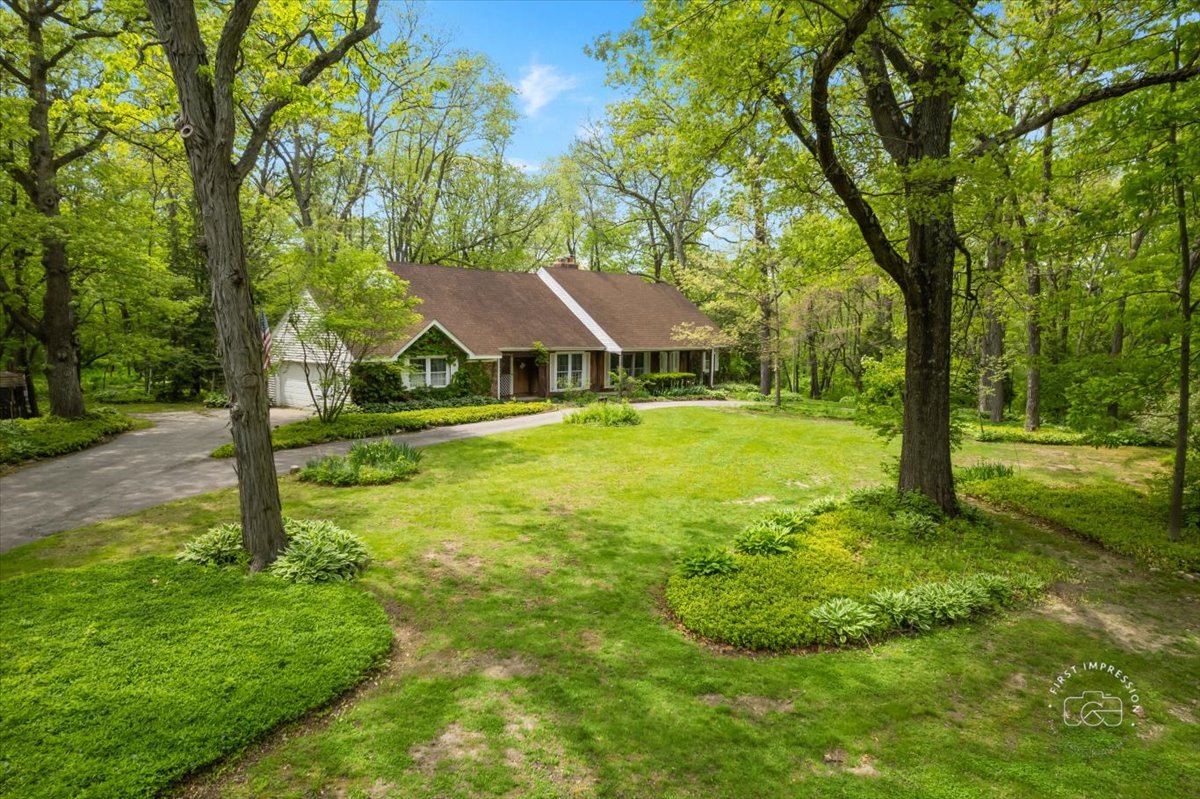 6N400 Old Homestead Road St. Charles, IL 60175 - Photo 2 of 32 a view of a house with a big yard