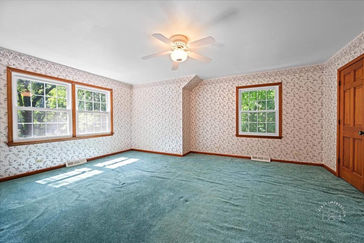 6N400 Old Homestead Road St. Charles, IL 60175 - Photo 25 of 32 a view of an empty room with a window
