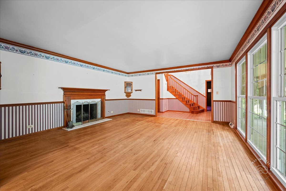 6N400 Old Homestead Road St. Charles, IL 60175 - Photo 6 of 32 a view of empty room with wooden floor