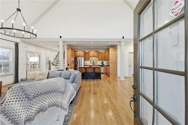 a view of a dining room with furniture window and wooden floor