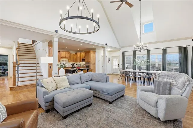 a kitchen with stainless steel appliances granite countertop a refrigerator sink and cabinets