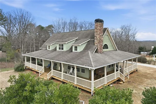 a backyard of a house with lots of green space