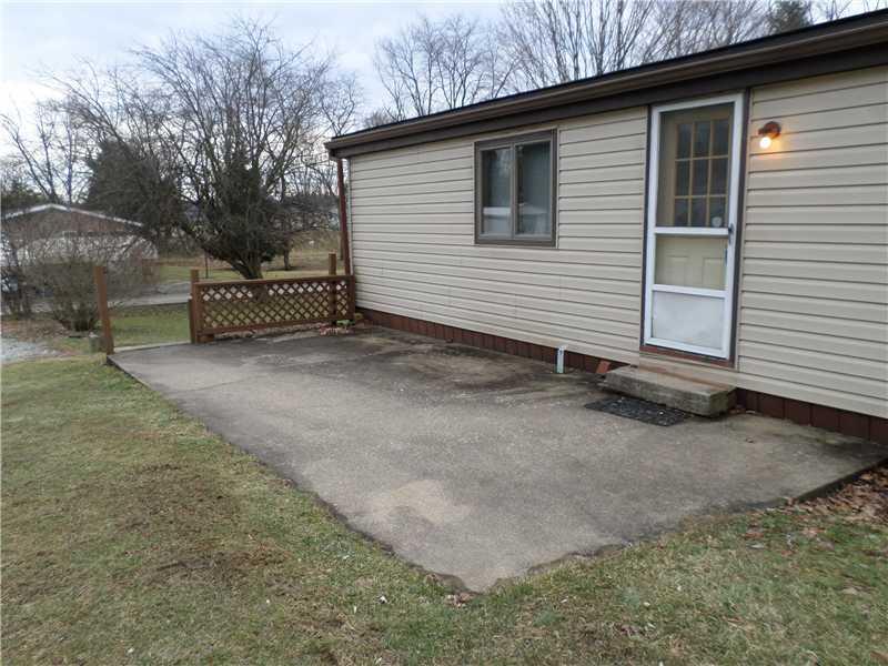 243 Country Club Road Waynesburg, PA 15370 - Photo 22 of 23 Patio/Deck. Picnic perfect oncrete patio off back