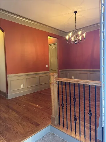 a view of a livingroom with wooden floor