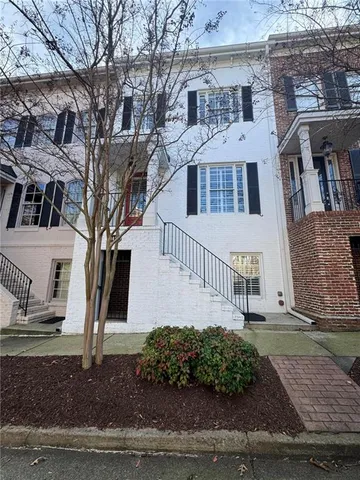 a view of a porch with wooden floor