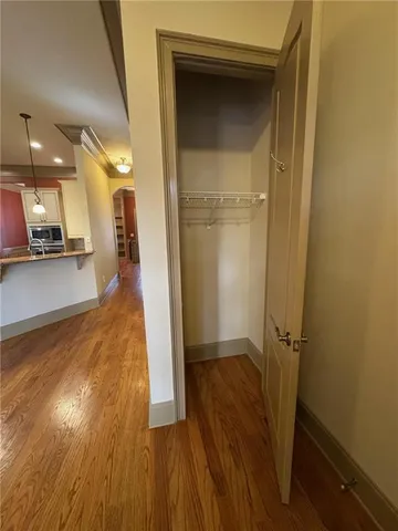 a kitchen with granite countertop a refrigerator and a stove