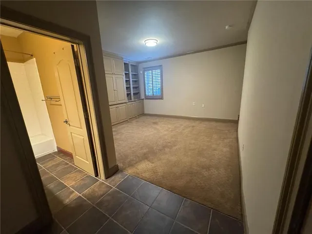 a view of a room with rack on the wall