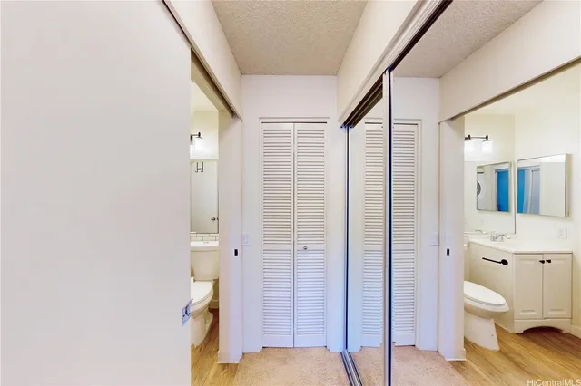 a bathroom with a shower and a toilet
