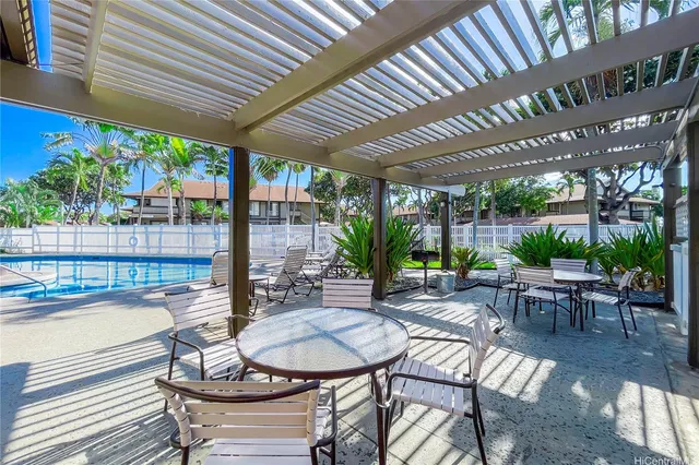 a patio with patio outdoor seating and yard
