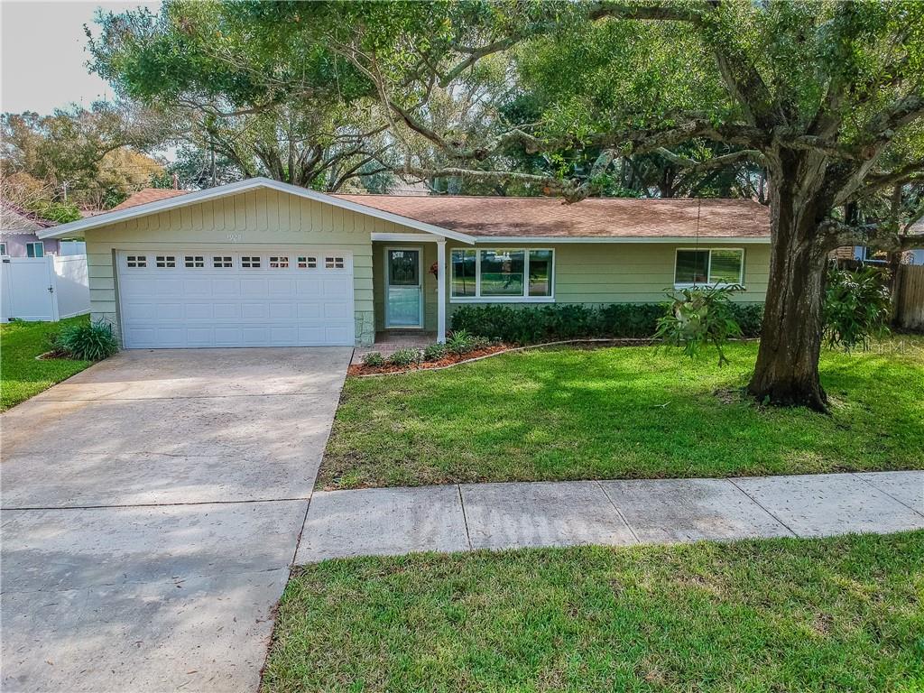 1925 Pinehurst Road Dunedin, FL 34698 - Photo 1 of 1 a view of a house with a yard