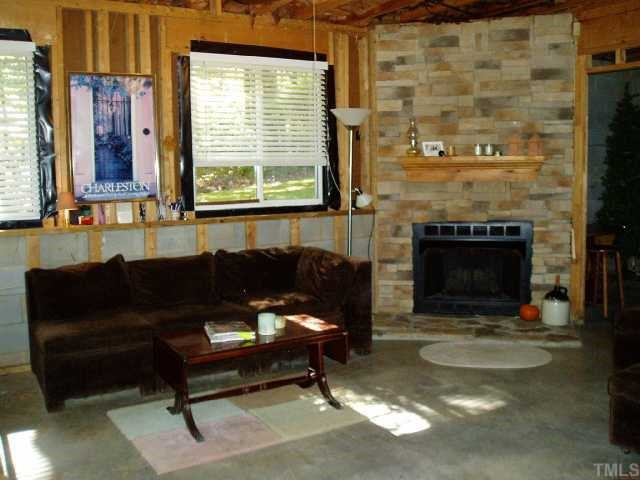 12000 Peed Road Raleigh, NC 27614 - Photo 12 of 12 Retreat in daylight basement with stone fireplace