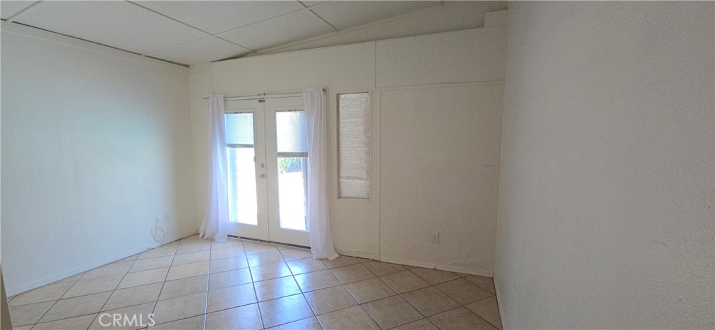 44470 San Pablo Avenue Palm Desert, CA 92260 - Photo 12 of 17 a view of an empty room and window
