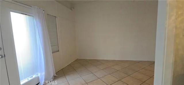 a bathroom with a sink a vanity and a window