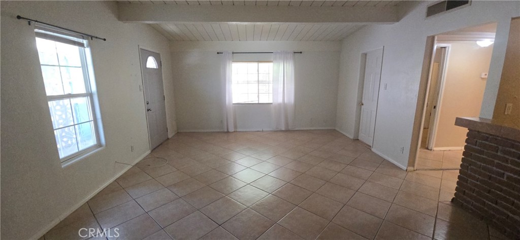 44470 San Pablo Avenue Palm Desert, CA 92260 - Photo 4 of 17 an empty room with windows