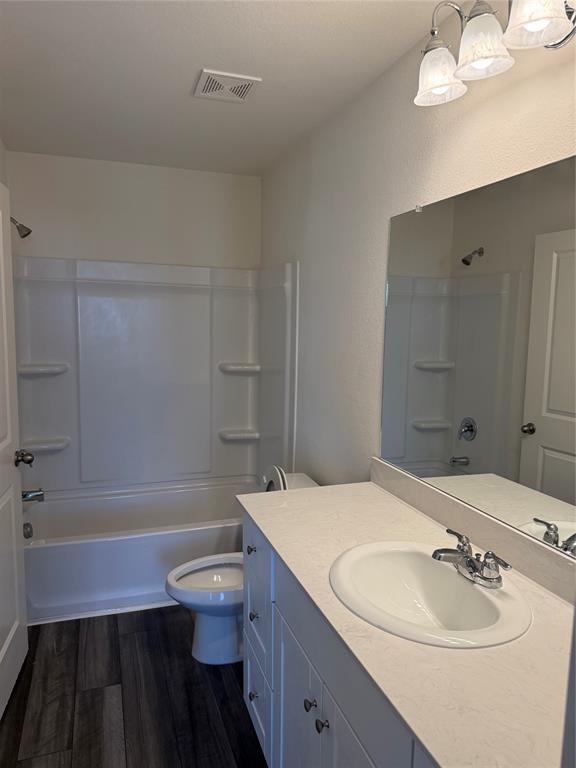 2104 Jackson Street Princeton, TX 75407 - Photo 7 of 15 a bathroom with a sink a toilet and shower