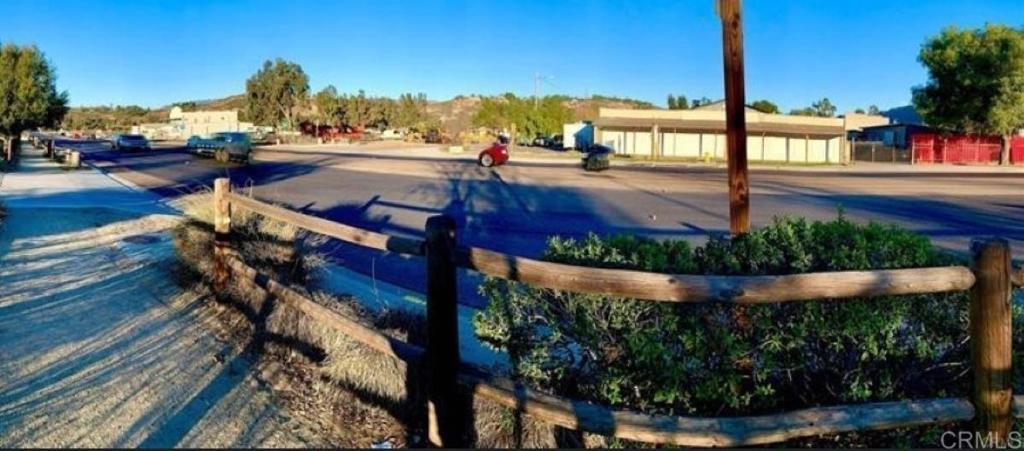a view of a swimming pool with an outdoor seating